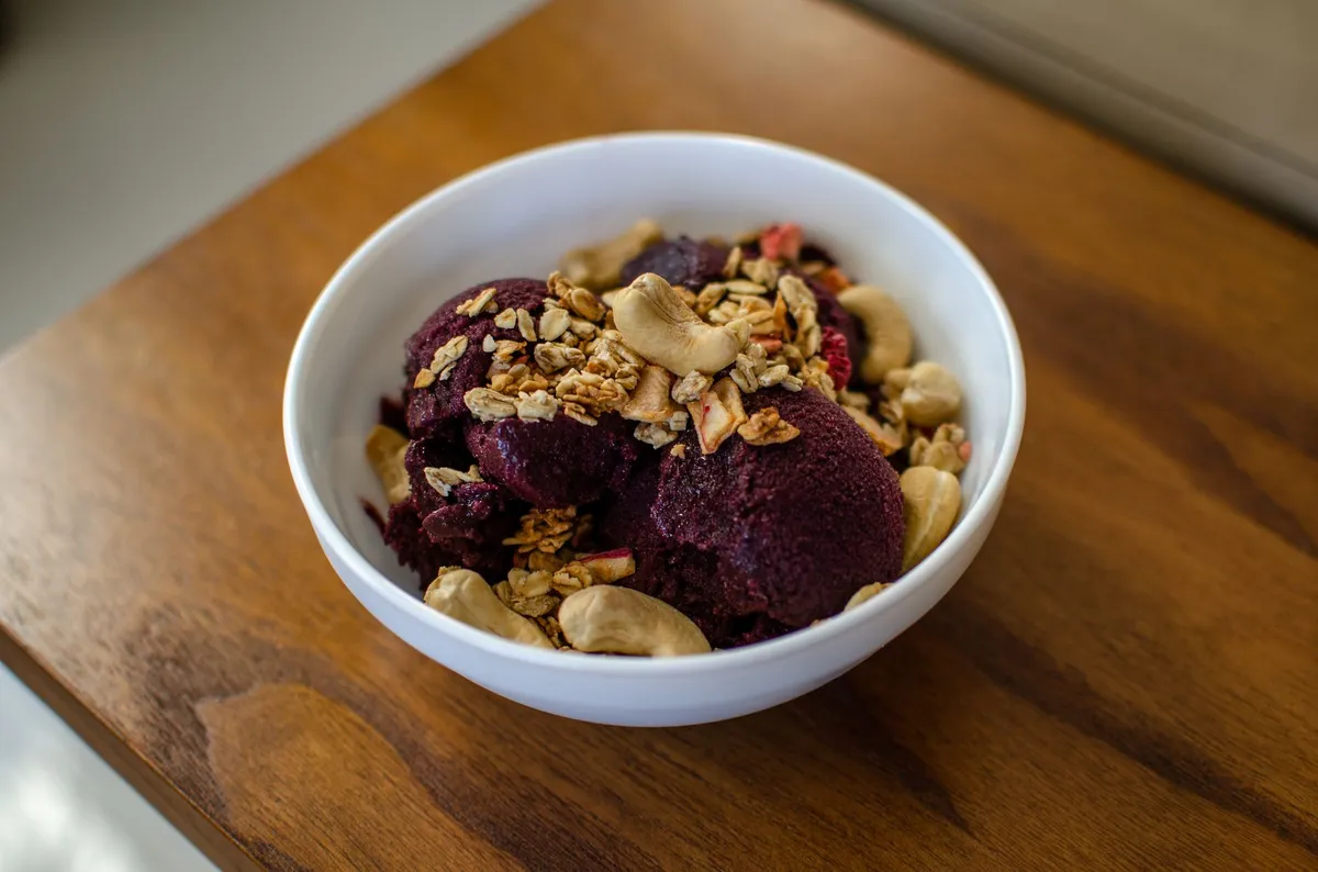 Fresh acai bowl with granola and berries at Pier 69 Market, Bay Ridge Brooklyn