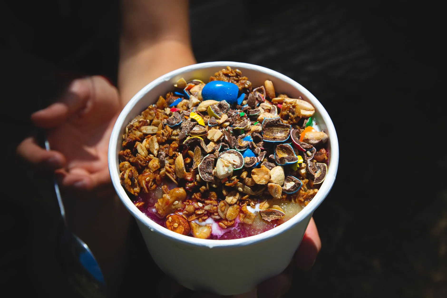 Fresh acai bowl with berries and granola at a Bay Ridge Brooklyn cafe near the waterfront